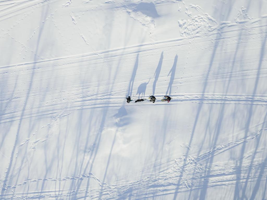 Aerial view of snowshoers on the Whitemouth River