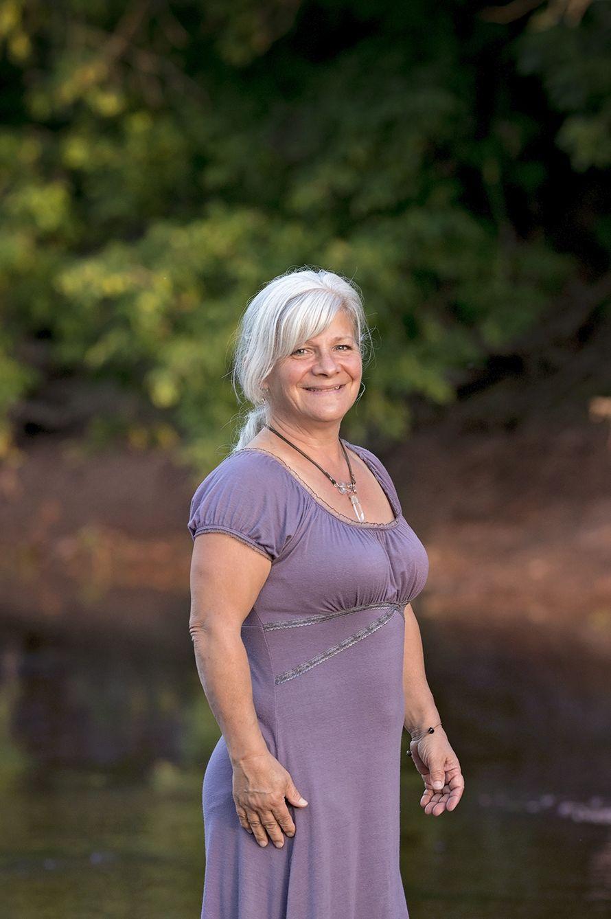 Jenny standing on a rock in the Whitemourth river